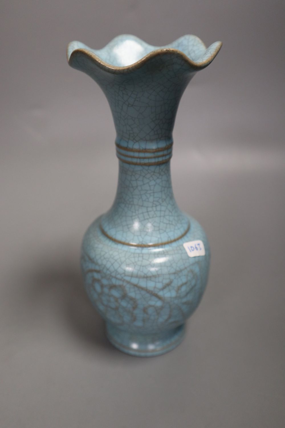 A Chinese green glazed teapot, 20.5cm high, a Cizhou type vase, a turquoise glazed vase and a Japanese tea bowl
